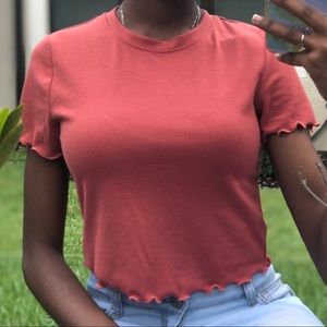 Salmon colored shirt